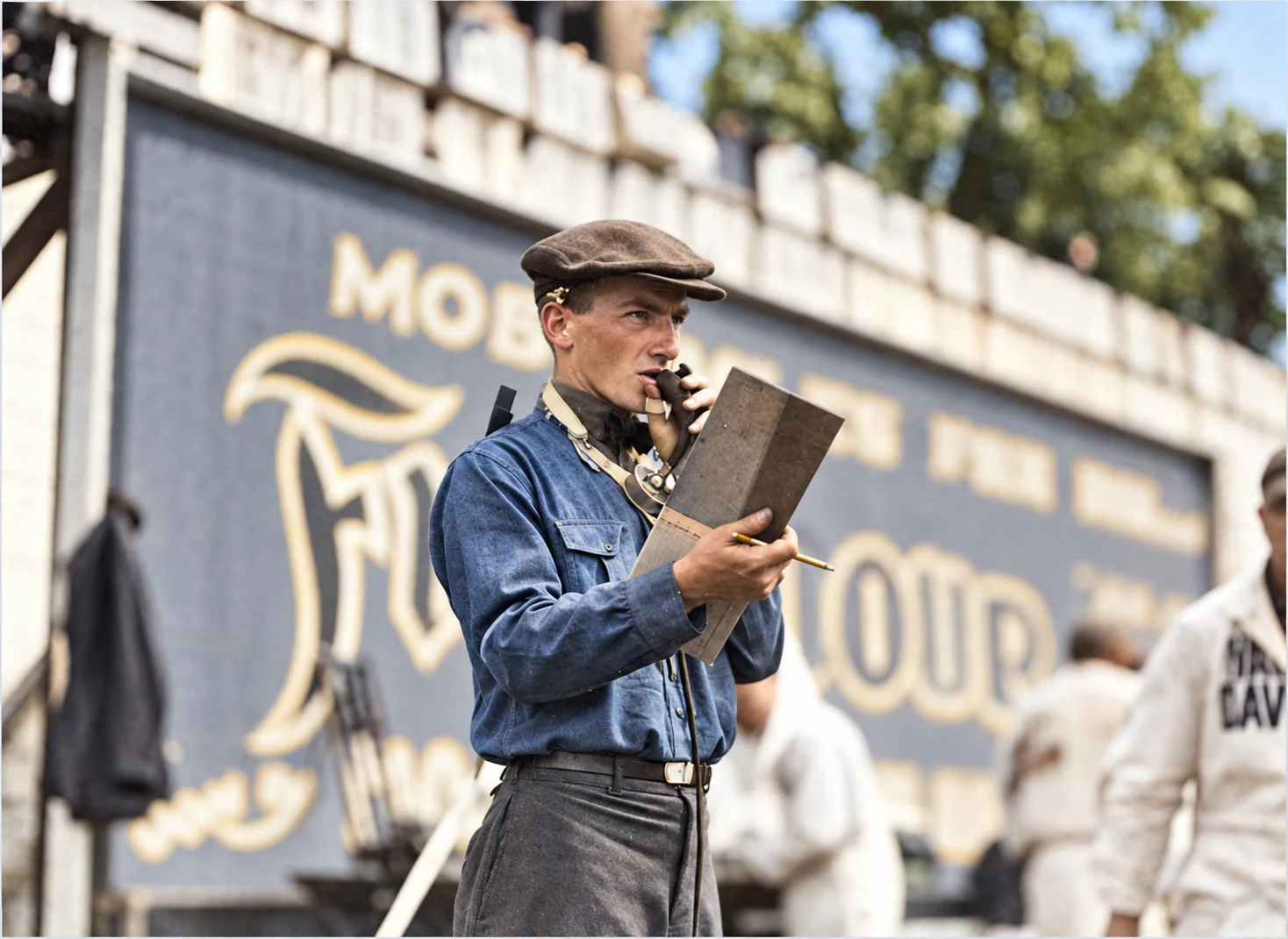 Restored and colorized portrait of a judge at the 1919 Marion motorcycle race